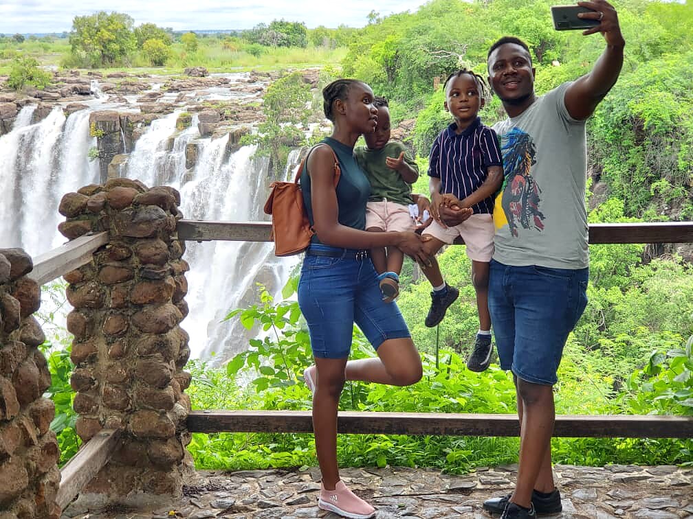 Pauline Saviye and her family at Victoria Falls in Livingstone